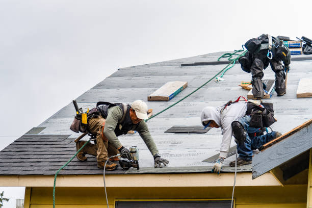 Professional Gutter Installation technician working in Albertson, NY